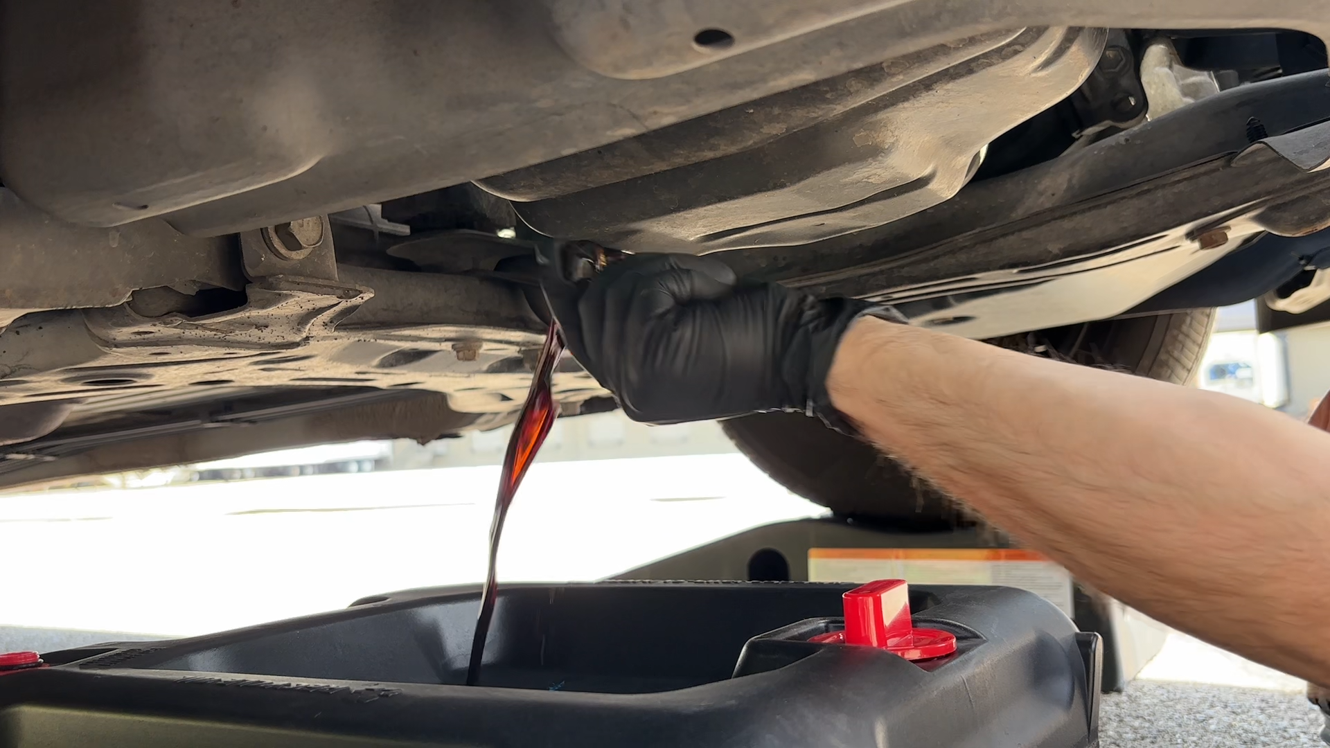 Drain the old engine oil using the drain plug at the bottom of your engine.